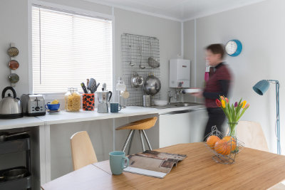 container housing lady in the kitchen