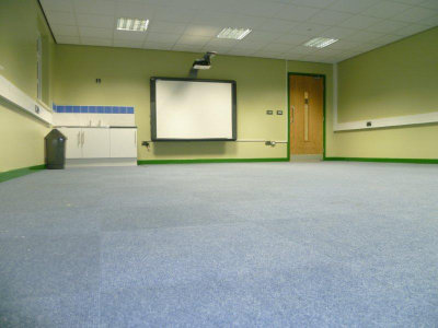 Interior of portable/temporary classroom unit container building including whiteboard