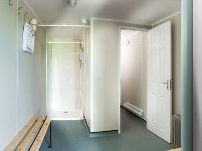 Container changing room with shower
